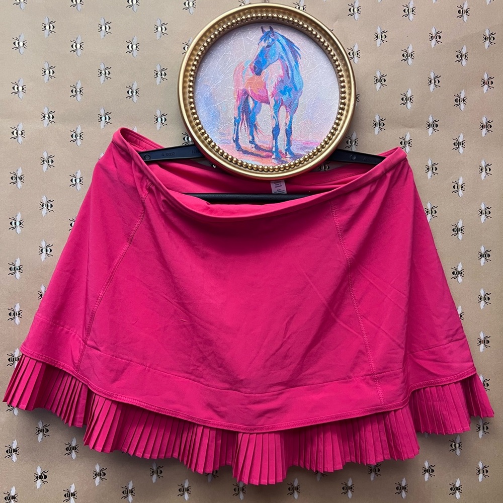 Elegant Pink Skirt with Pleated Hem